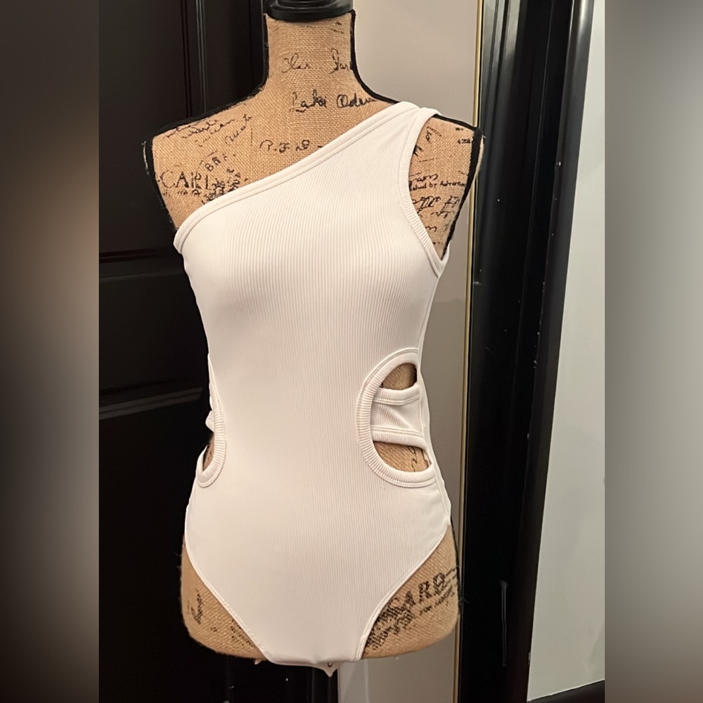 ABERCROMBIE - BODY SUIT - Cream colored cut out body suit.